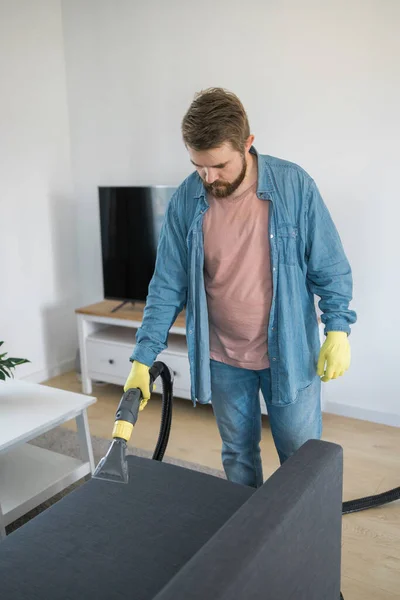 Man Holding Modern Washing Vacuum Cleaner Cleaning Dirty Sofa Professionally — Stock Photo, Image