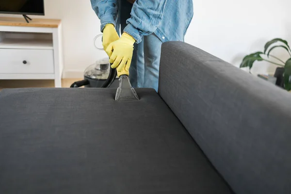 Man Holding Modern Washing Vacuum Cleaner Cleaning Dirty Sofa Professionally — Foto Stock
