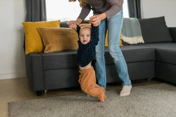 Baby Taking First Steps Mothers Help Home Concept — Stock Photo, Image