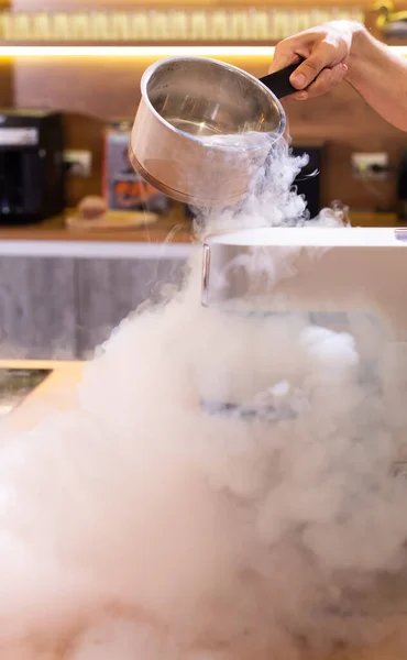 smoke vapor dry ice in bowl in the kitchen