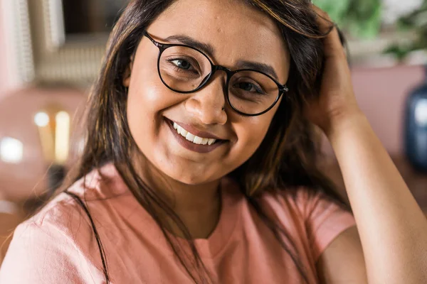 Stock image Head shot portrait smart confident smiling millennial indian woman. Attractive young hindu teenager student girl freelancer looking at camera, posing for photo