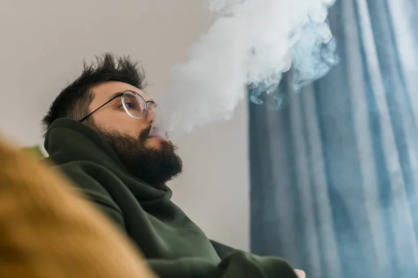 Bearded Man Smoking Hookah Home Blowing Cloud Smoke Chill Time — Stok Foto