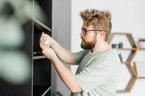 Young Attractive Man Assembles Furniture Handwerker Interior Objects — Stock Photo, Image