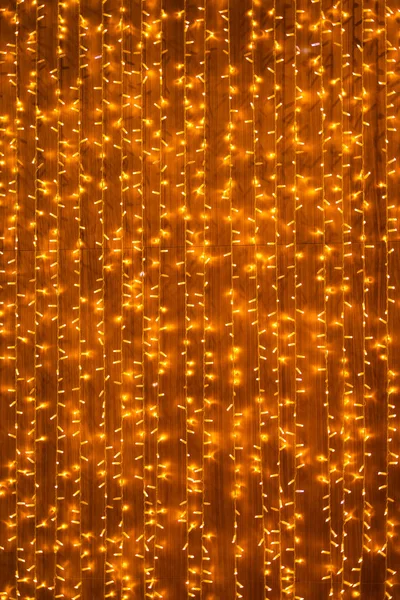 Christmas ornaments bright light garlands. Set Xmas decoration string light garland yellow and gold colored. Copy space and empty place for advertising mock up.