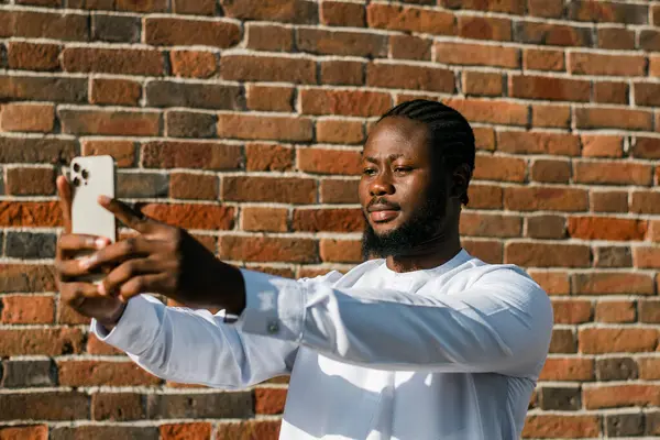 Happy Young African American Man Dashiki Ethnic Clothes Taking Selfie Stock Picture