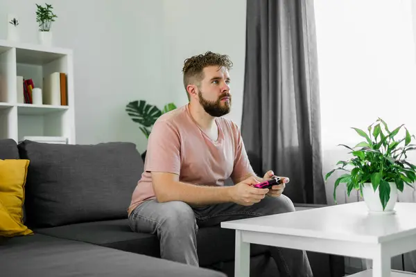 Man Playing Videogames Living Room Sitting Sofa Jogdíjmentes Stock Fotók
