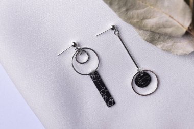 Handmade jewelry on a textile background. Gift for women. Bijouterie and jewellery for women