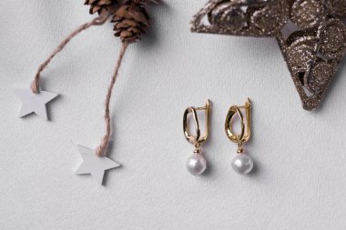 Handmade jewelry on a textile background. Gift for women. Bijouterie and jewellery for women