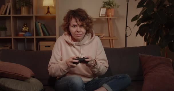 Caucasian Woman Playing Video Game Sitting Sofa Living Room Using — Stock video