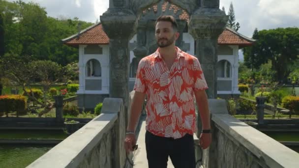 Young Confident Man Walking Bridge Bearded Handsome Guy Traveling Tourist — Stock Video