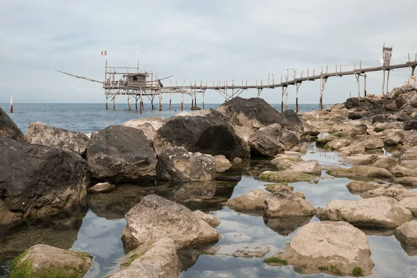 stock image Vasto, Abruzzo, Italy-April 29, 2023: Trabocco Turchino in San Vito Chietino, Abruzzo. Trabucco a sort of Trebuchet, traditional fishing house on Costa dei Trabocchi.