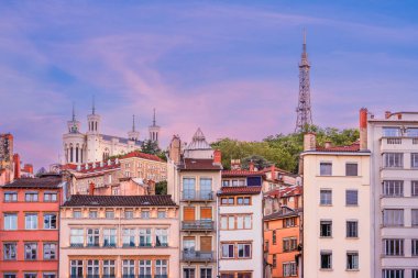 Idyllic Lyon Cityscape with the Vieux Lyon buildings, the Basilica Fourviere and the Metallic Tower in France clipart