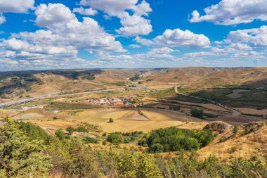 View of the Soria province landscape in Medinaceli municipality in summertime clipart