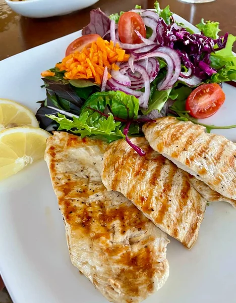 stock image Healthy eating; grilled chicken and garden fresh salad