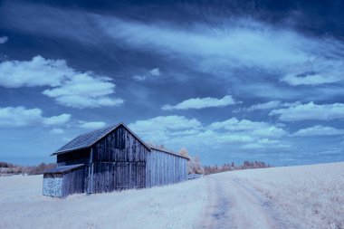 infrared photography - ir photo of landscape under sky with clouds - the art of our world in the infrared spectrum