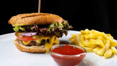 Juicy fresh burger and fries potato on white plate, tasty fast food