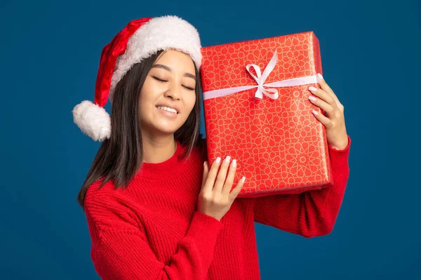 Happy Woman Holds Gently Long Awaited Christmas Gift Beautiful Asian — Stock Photo, Image