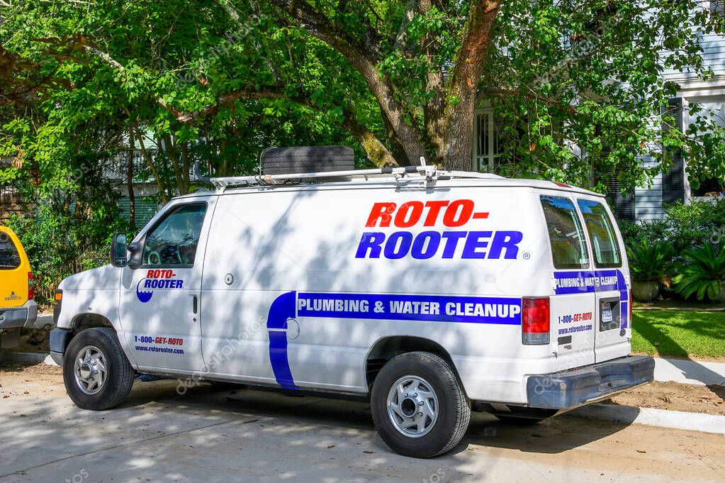 NEW ORLEANS, LA, USA - JULY 19, 2023: Roto-Rooter service van in an Uptown neighborhood