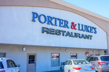 Metairie, LA, USA - FEBRUARY 6, 2024: Front of Porter and Luke's Restaurant on Metairie Road clipart