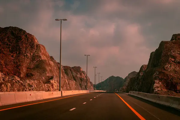 stock image Khorfakkan mountain road, road sign