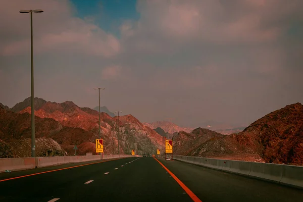 stock image Khorfakkan mountain road, road sign