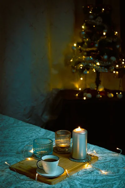 christmas composition with candles and candle on the table