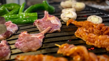 Closeup of shish meat with vegetables 