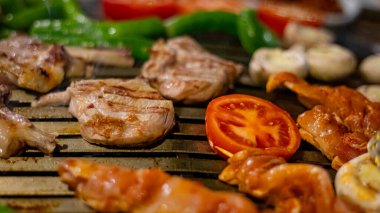 Closeup of shish meat with vegetables 
