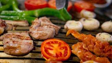 Closeup of shish meat with vegetables 