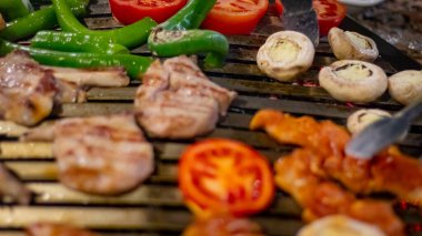 Closeup of shish meat with vegetables 