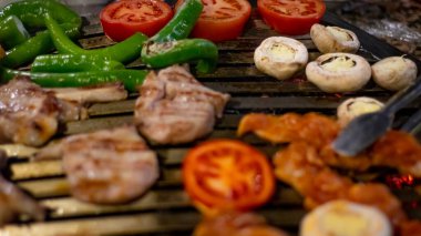 Closeup of shish meat with vegetables 