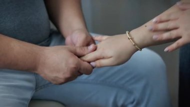 young people are sitting and giving a knee pain