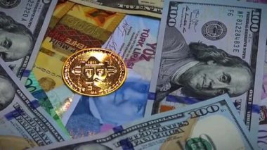 Paper banknotes of 100 dollars, 100 Turkish lira, 500 dirhams are mixed on the table