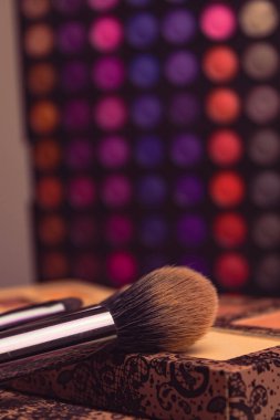 Cosmetic.Makeup.Eye-shadow with blush with pink powder.