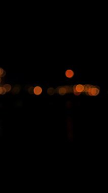 Işığın soyut bokeh arkaplanı, ışık sızıntısı arka plan animasyon stok görüntülerini etkiler. Mercek ışığı etrafta yanıp sönüyor ve soyut bir arka plan animasyonu oluşturuyor. 4K 'de klasik ışık sızıntısı, sarı Horizon klas ışık sızıntısı. Yüksek kalite 