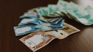 Katarlı bir riyal banknot, makro yakın çekim, Katar parası yakın plan. Yüksek kalite fotoğraf