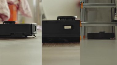 Robot süpürgesi yatak odasının yerlerini süpürüyor. Hayatı basitleştiren otomatik cihazları olan akıllı bir ev. Akıllı bir elektrikli süpürge zemini temizler. Yüksek kalite 4k görüntü