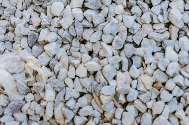 Ezilmiş kaya. Küçük kayalıklar. Parçalanmış taş yol inşaatı materyal çakıl dokusu. Küçük taş inşaatı, materyal kayaları topluyor. Bahçe çakıl arka plan taş peyzaj. Çakıl yolu yolu. Yüksek kalite fotoğraf