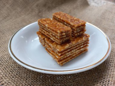 stack of ting ting enting enting indonesian traditional sweet peanut brown sugar candy snack 