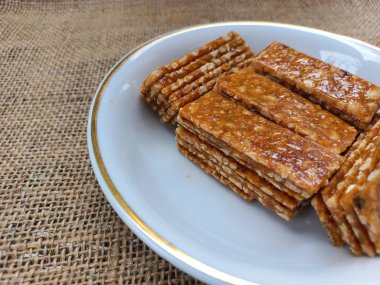 stack of ting ting enting enting indonesian traditional sweet peanut brown sugar candy snack 