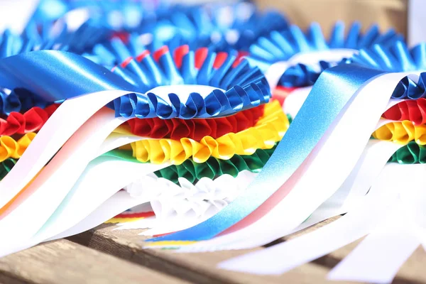 stock image Pile of horse sport trophies rosettes at equestrian event at summertime outdoors