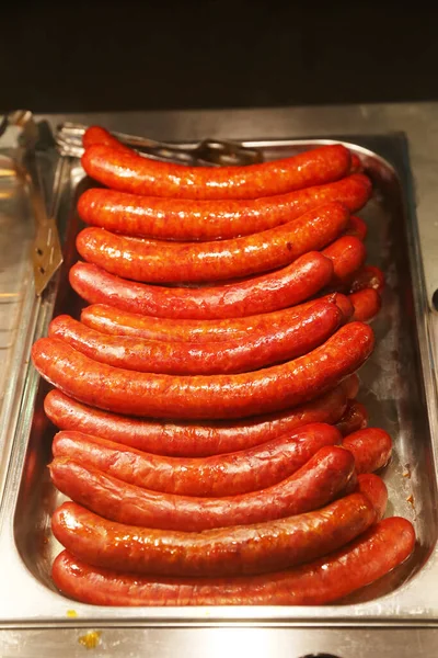 stock image  Bratwurst sausage in a butcher\'shop for sale.  Pork and beef sausages astraditional fast food for all