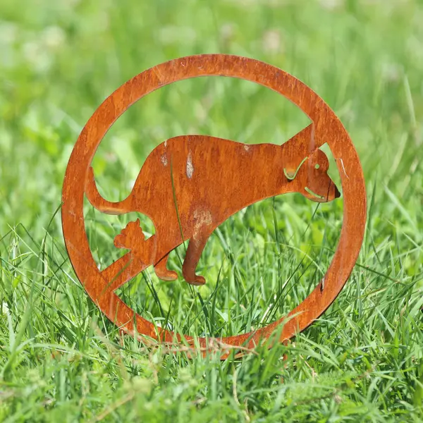 stock image No dog pooping prohibition sign isolated on rusty metallic plate against green natural background. Animal poo allowed, pooping restricted. Park prohibition sign.