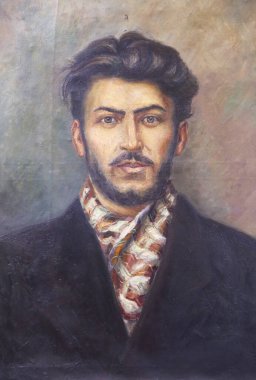 01 numara. Mayıs 2025 Gori Georgia - Joseph Vissarionovich Dzhugashvili 'nin Portresi diğer adıyla Stalin doğduğu kasabada asılı duruyor. Gori şehrindeki Stalin Müzesi 'nde sergi 