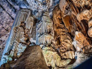 Stalactites hang from the roof Cango Caves, Oudtshoorn, Garden route, Western Cape, South Africa clipart