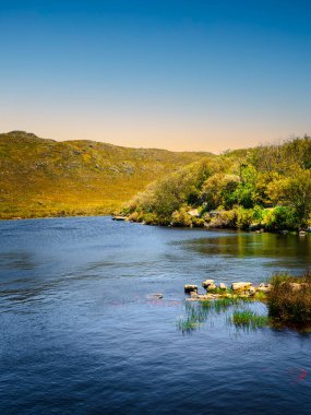 Silvermine dam and mountain in the Silvermine Nature Reserve, Cape Town, South Africa clipart