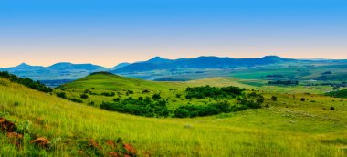 Panorama shot of the rolling hills and valleys of Wakkerstroom, Mpumalanga, South Africa clipart