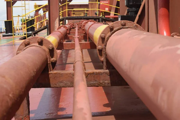 conduit pipeline fittings on deck of a ship for transferring electric cables throughout the ship structure
