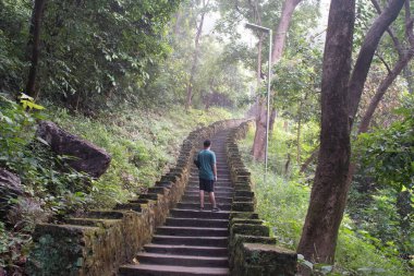 sundargarh, odisha, india - october 14, 2024 : teen in a hiking trail at 