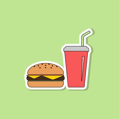 Yeşil arka planda samanlı hamburger ve soda..